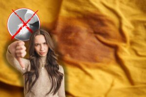 macchia d'unto su indumento giallo, x rossa su talco e donna con pollice in giù