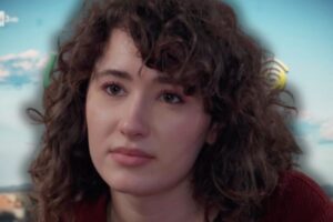 logo upas sullo sfondo ed anna in primo piano