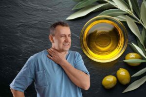 uomo con mal di gola e olio evo